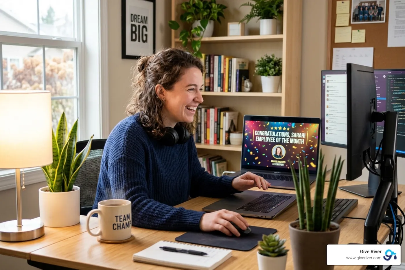 Remote team member receiving a digital recognition award on their laptop - remote work culture building