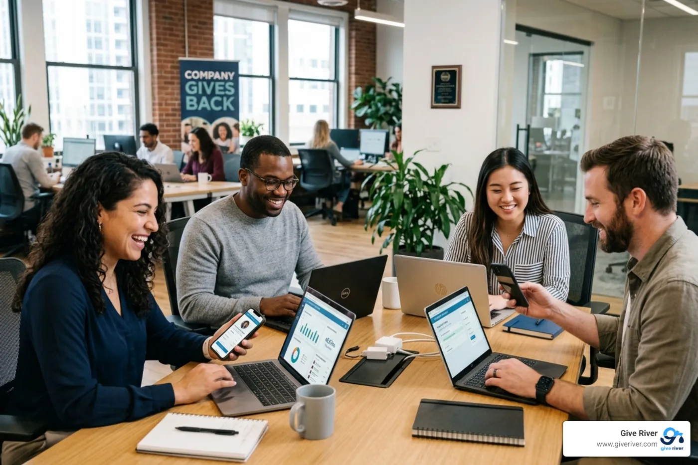 employees tracking volunteer hours on a digital platform - Corporate citizenship examples