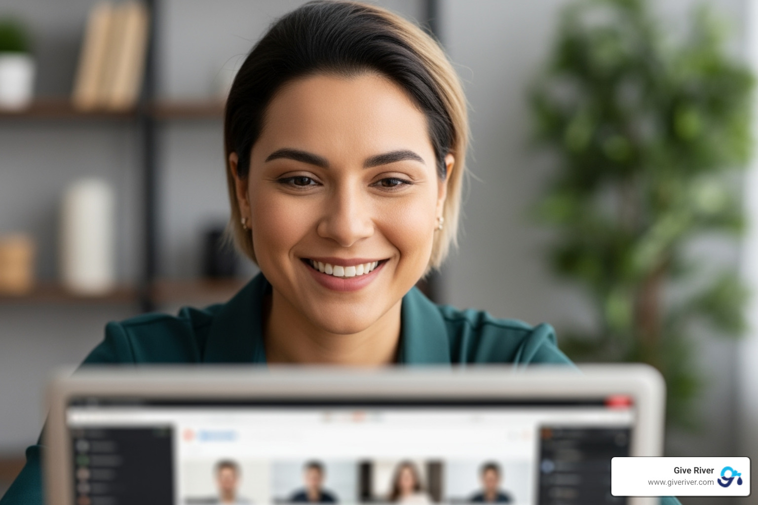 person smiling while hosting a virtual event on their laptop - free online quiz for team building