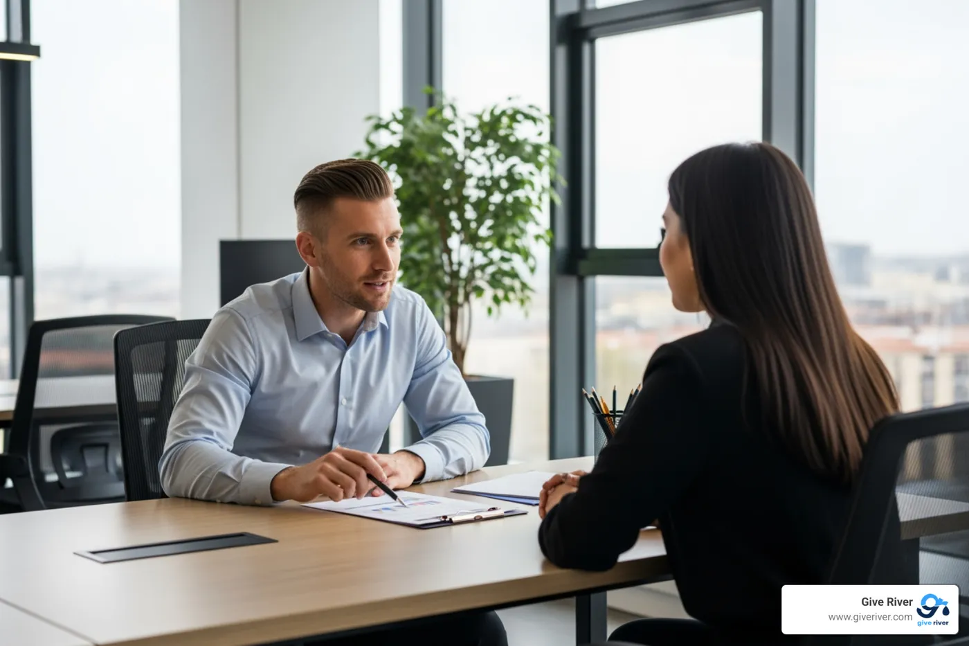 Manager providing constructive feedback to an employee during a performance review