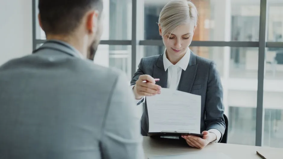 manager and employee reviewing a development plan during a 1-on-1 - employee development resources
