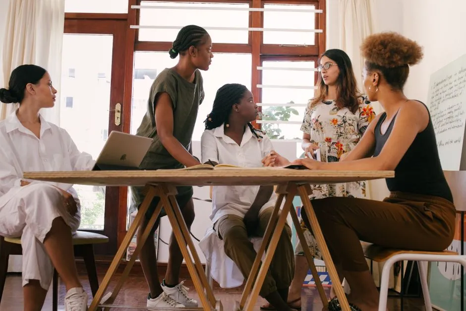 diverse team collaborating successfully in a modern office - personal growth content