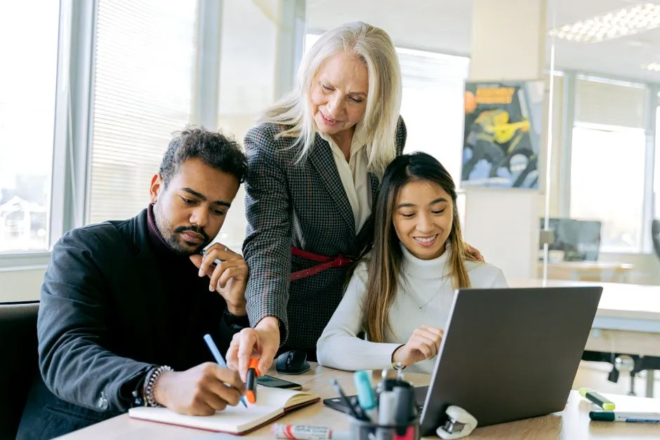 Team collaborating on career development planning - career development programs examples
