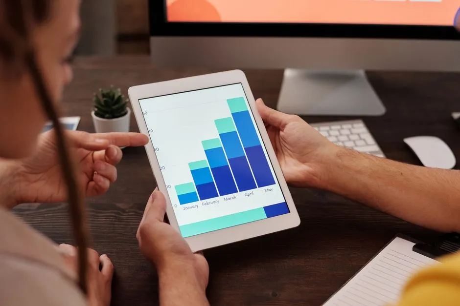 Manager reviewing team engagement analytics on a digital dashboard - employee engagement tools for managers