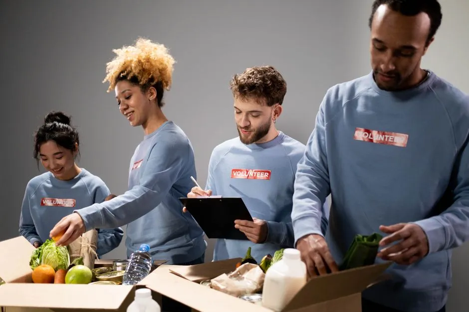 employees volunteering at a local food bank - csr initiatives examples