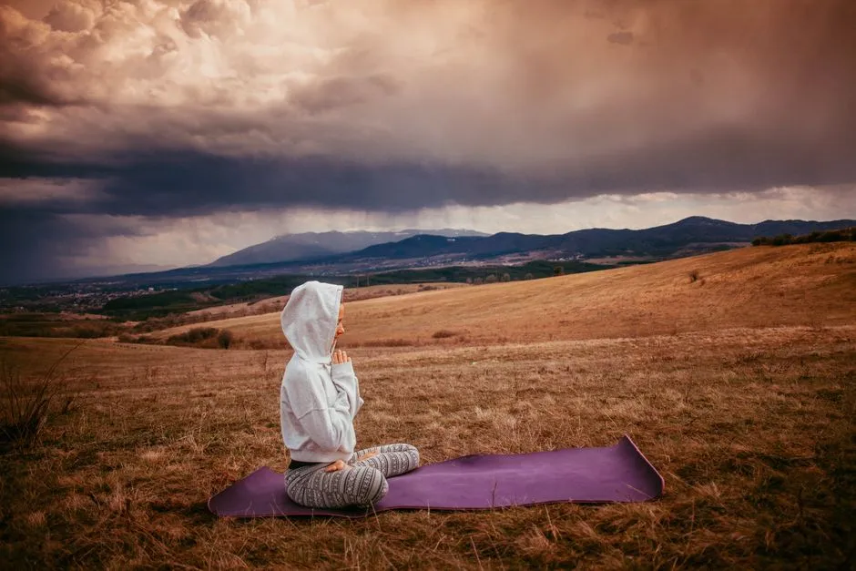 person meditating in a serene setting - personal growth content