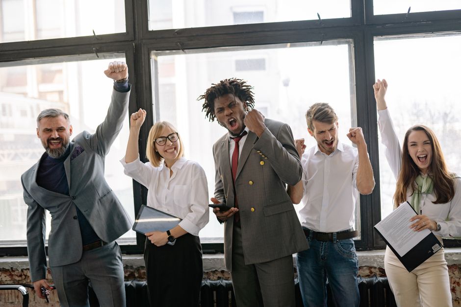 diverse team celebrating a milestone