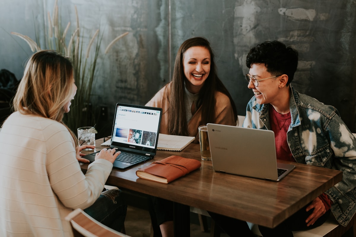 Various professionals engaging in different training methods including classroom settings, digital learning, mentoring sessions, and hands-on workshops - depicting the spectrum of learning and development approaches