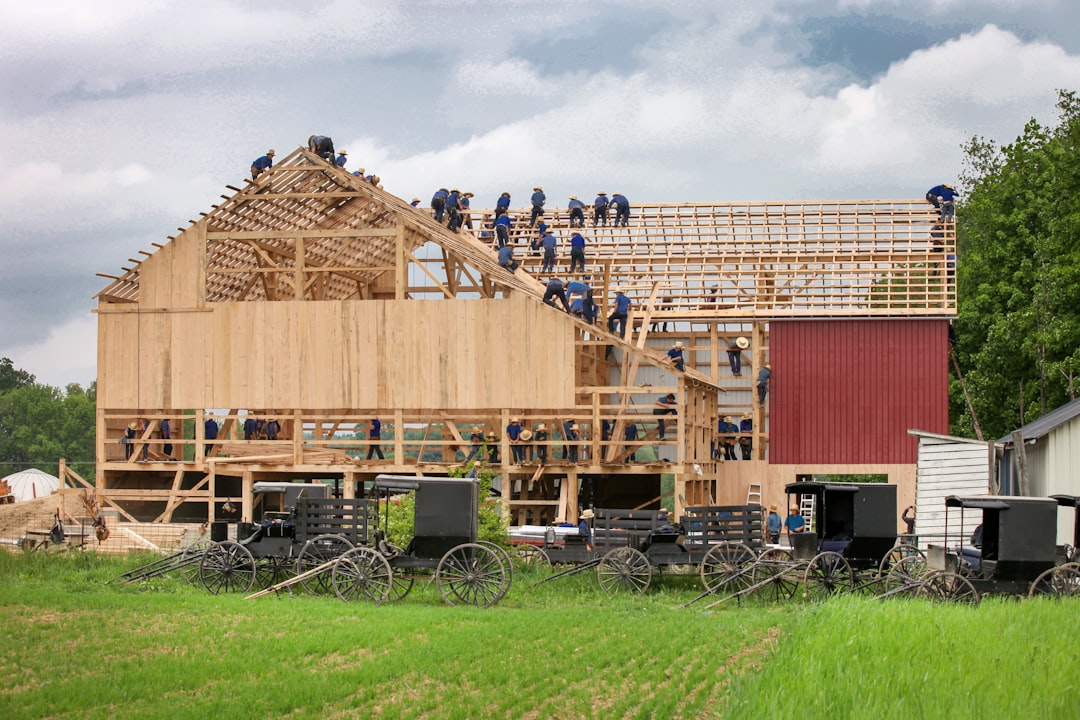 corporate team building a house with Habitat for Humanity - volunteer opportunities for businesses