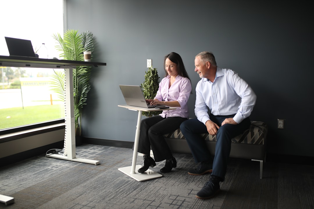 manager and employee having a positive one-on-one meeting in a casual setting - workplace culture improvement ideas