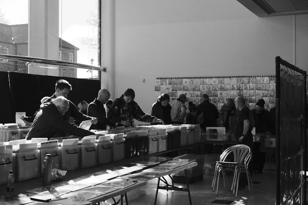 employees volunteering at food bank sorting donations - what are three ways businesses demonstrate corporate social responsibility