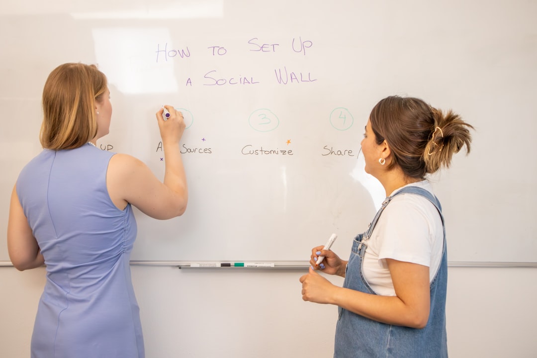 Team brainstorming CSR ideas on a whiteboard - government csr initiatives