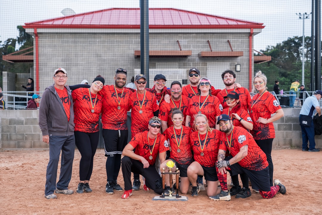 A happy team holding trophies and smiling together